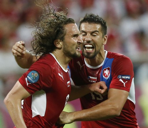 Czech Republic's Jiracek celebrates scoring a goal with team mate Baros during their Group A Euro 2012 soccer match against Poland at the City Stadium in Wroclaw