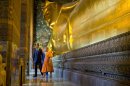 U.S. President Barack Obama, left, and U.S. Secretary of State Hillary Rodham Clinton, rear, tour the Viharn of the Reclining Buddha with Chaokun Suthee Thammanuwat, the Dean, Faculty of Buddhism Assistant to the Abbot of Wat Phra Chetuphon at the Wat Pho Royal Monastery in Bangkok, Thailand, Sunday, Nov. 18, 2012. (AP Photo/Carolyn Kaster)