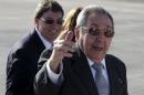 Cuba's president Castro talks to the media next to Cuba's Foreign Minister Rodriguez during the departure of French President Hollande at Jose Marti airport in Havana