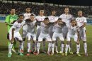 Tunisia's national soccer team players line up for a team photo before their African Cup of Nations qualification match for the 2013 Africa Cup of Nations against Sierra Leone at Monastir Olympic Stadium