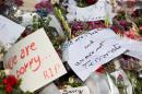 Flower bouquets are seen at the site of a shooting attack on the beach in front of the Riu Imperial Marhaba Hotel in Port el Kantaoui, on the outskirts of Sousse south of the capital Tunis, on June 29, 2015