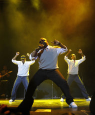 FILE - In this July 1, 2011 file photo, Boyz II Men, from left, Nathan Morris, Wanya Morris and Shawn Stockman perform at the 2011 Essence Music Festival in New Orleans. The group is preparing to celebrate their milestone anniversary this fall with a new album, including reworked versions of their now-classic hits. (AP Photo/Gerald Herbert, file)