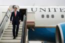 US Secretary of State John Kerry arrives at Queen Alia International Airport on January 5, 2014 in Amman