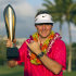 Russell Henley poses with the trophy after winning the Sony Open golf tournament, Sunday, Jan. 13, 2013, in Honolulu. (AP Photo/Marco Garcia)