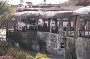 This image made from video released by UNSMIS, the UN observer mission in Syria and accessed Saturday, June 9, 2012, purports to show destroyed buses after overnight fighting in Damascus, Syria. In Damascus, residents spoke about a night of shooting and explosions in the worst violence Syria's capital has seen since the uprising against President Bashar Assad's regime began 15 months ago.(AP Photo/UNSMIS via AP video) THE ASSOCIATED PRESS CANNOT INDEPENDENTLY VERIFY THE CONTENT, DATE, LOCATION OR AUTHENTICITY OF THIS MATERIAL