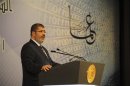Egypt's President Mohamed Mursi speaks during an event marking Science Day in Cairo
