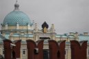 The logo of Russia's top crude producer Rosneft is seen at the company's headquarters, behind the Kremlin wall, in central Moscow