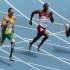 South Africa's Oscar Pistorius, left, Qatar's Femi Ogunode, center, and USA's Tony McQuay compete in a heat of the Men's 400m at the World Athletics Championships in Daegu, South Korea, Sunday, Aug. 28, 2011.  (AP Photo/Kevin Frayer)