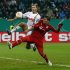 Munich's Schweinsteiger attempt to score against Augsburg during their German DFB Cup (DFB Pokal) round of sixteen soccer match in Augsburg