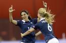 France's Louisa Necib, left, celebrates her goal against Germany with teammate Amandine Henry during the second half of a FIFA Women's World Cup quarterfinal soccer game, Friday, June 26, 2015, in Montreal, Canada. (Ryan Remiorz/The Canadian Press via AP) MANDATORY CREDIT