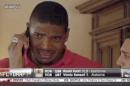 In this image taken from video, Missouri defensive end Michael Sam cries as he talks on a mobile phone at a draft party in San Diego, after he was selected in the seventh round, 249th overall, by the St. Louis Rams in the NFL draft Saturday, May 10, 2014. The Southeastern Conference defensive player of the year last season came out as gay in media interviews this year. (AP Photo/ESPN)