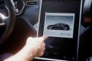 The Tesla Model S version 7.0 software update containing Autopilot features is demonstrated during a Tesla event in Palo Alto