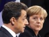FILE - In this Dec. 10, 2010 file photo, French President Nicolas Sarkozy and German Chancellor Angela Merkel talk at a press conference during the German-French consultations in Freiburg, Germany. Chancellor Merkel travels to Paris Tuesday Aug. 16, 2011, armed with plans for a new EU body to enforce strict budget limits and fiscal policy and calls for all eurozone nations to enshrine a balanced budget in their constitution. (AP Photo/Michael Probst,File)