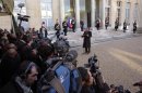 Cameroon's President Paul Biya speaks to journalists as he leaves the Elysee Palace in Paris