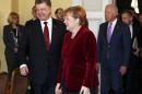 Ukraine's President Poroshenko, German Chancellor Merkel and U.S. Vice President Biden arrive for a meeting during the 51st Munich Security Conference at the 'Bayerischer Hof' hotel in Munich
