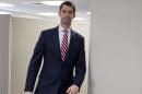 Sen. Tom Cotton, R-Ark. arrives to pose for photographers in his office on Capitol Hill in Washington, Wednesday, March 11, 2015. The rookie Republican senator leading the effort to torpedo an agreement with Iran is an Army veteran with a Harvard law degree who has a full record of tough rhetoric against President Barack Obama's foreign policy. (AP Photo/Carolyn Kaster)