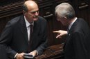 Il premier uscente Mario Monti e il leader del Pd Pier Luigi Bersani alla Camera dei deputati