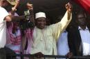 Gambia's President-elect Adama Barrow gestures to the crowd following his victory in the polls in Kololi on December 2, 2016