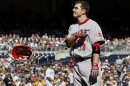 Cincinnati Reds first baseman Joey Votto tosses his helmet after striking out against the San Diego Padres in San Diego