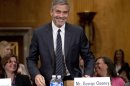 Actor George Clooney arrives on Capitol Hill in Washington, Wednesday, March 14, 2012, to testify before the Senate Foreign Relations Committee hearing on Sudan. (AP Photo/Manuel Balce Ceneta)