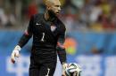 United States' goalkeeper Tim Howard gets ready to kick the ball during the World Cup round of 16 soccer match between Belgium and the USA at the Arena Fonte Nova in Salvador, Brazil, Tuesday, July 1, 2014. (AP Photo/Natacha Pisarenko)