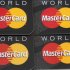 This Jan. 30, 2012 photo, shows four posed MasterCard credit cards, in Surfside, Fla. Payments processor MasterCard Inc. said Thursday, Feb. 2, 2012, it recorded a $495 million charge in its fourth-quarter to cover potential losses related to an ongoing lawsuit brought by merchants over the fees they pay on credit card transactions. (AP Photo/Wilfredo Lee)