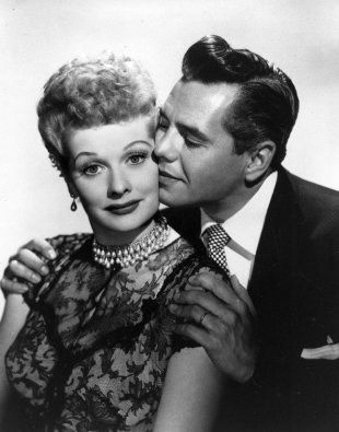 In this undated image provided by CBS, comedian-actress Lucille Ball and her husband, musician-actor Desi Arnaz, from the comedy series, 