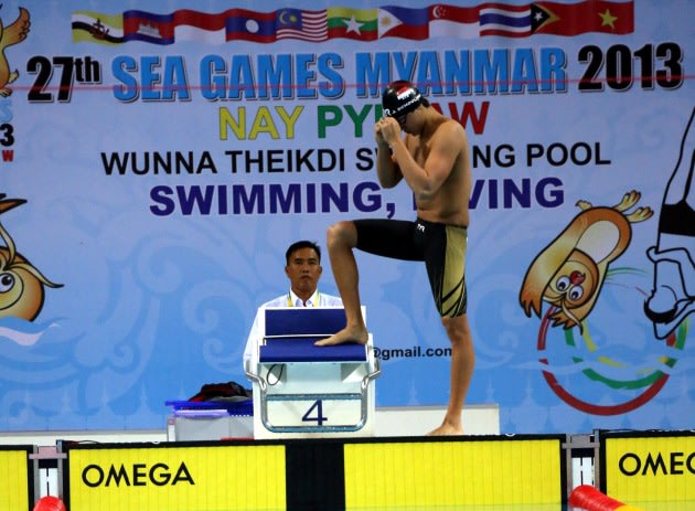 Joseph Isaac Schooling of Singapore prepares for the Mens 100m Butterfly Final during the 2013 SEA Games at the Wunna Theikdi Aquatic Centre on December 14, 2013 in Nay Pyi Taw, Burma. (Photo by Stanley Chou/Getty Images)