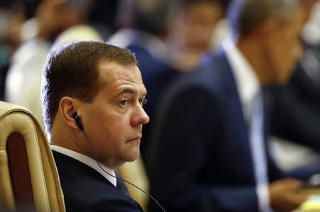 Medvedev attends the EAS plenary session during the ASEAN Summit in Naypyitaw