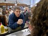 Republican presidential candidate, Texas Gov. Rick Perry is confronted on his stance on gay marriage by Shannon Graves, right, of Summerville, S.C., during a campaign visit, Thursday, Jan. 12, 2012, in Summerville, S.C. (AP Photo/David Goldman)