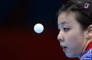 USA's Ariel Hsing hits a shot during a first round table tennis match against Mexico's Yadira Silva at the 2012 Summer Olympics, Saturday, July 28, 2012, in London. (AP Photo/Sergei Grits)