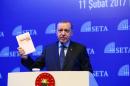 Turkish President Erdogan makes a speech during a symposium on presidential system in Istanbul