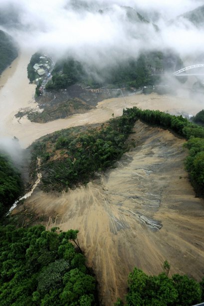 A collapsed slope caused by Tropical storm Talas is seen in Gojo, Nara Prefecture, Japan