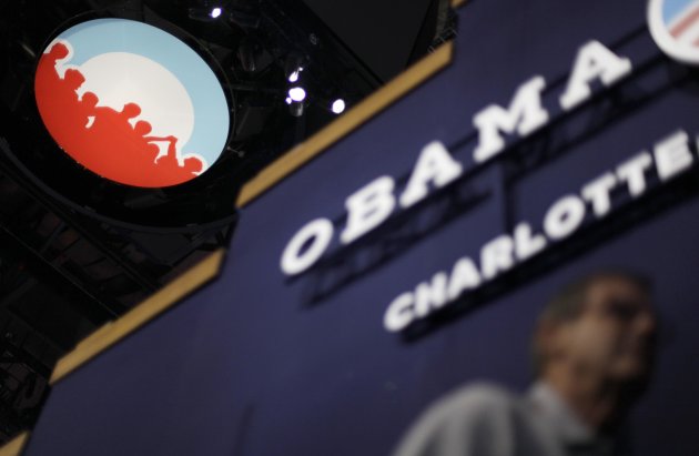 Obama campaign logo is seen under the scoreboard hanging from the ceiling inside of Time Warner Cable Arena at the Democratic National Convention in Charlotte, N.C., on Monday, Sept. 3, 2012. (AP Photo/David Goldman)