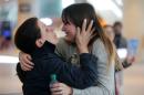 Shanez Tabarsi is greeted by her daughter Negin after traveling to the U.S. from Iran following a federal court's temporary stay of U.S. President Donald Trump's executive order travel ban at Logan Airport in Boston