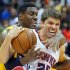 Atlanta Hawks' Kyle Korver and Indiana Pacers' Ian Mahinmi scramble for the ball during the second half of Game 6 of an NBA basketball first-round playoff series Friday, May 3, 2013, in Atlanta. The Pacers won 81-73 and took the series. (AP Photo/Atlanta Journal Constitution, Curtis Compton) GWINNETT OUT  MARIETTA OUT