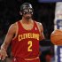 Cleveland Cavaliers' Irving brings the ball up court against New York Knicks during their NBA basketball game in New York