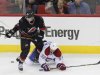 Carolina Hurricanes' Semin battles Montreal Canadiens' Moen for the puck during the third period of their NHL hockey game in Raleigh