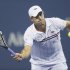 Andy Roddick returns a shot to Argentina's Juan Martin Del Potro in the fourth round of the 2012 US Open tennis tournament,  Tuesday, Sept. 4, 2012, in New York. (AP Photo/Charles Krupa)