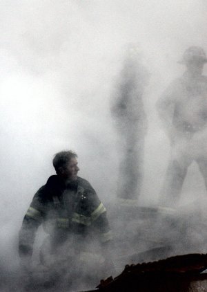 FILE - In this Sept. 14, 2001 file photo, a firefighter …