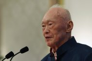Singapore's former Prime Minister Lee Kuan Yew speaks during his book launch at the Istana in Singapore August 6, 2013. The new book by Lee entitled One Man's View of the World was launched on Tuesday. The 400-page book touched on developments around the world and contained harsh words about neighbouring Malaysia, which Lee had terse relations with when he was prime minister. REUTERS/Edgar Su (SINGAPORE - Tags: POLITICS MEDIA HEADSHOT)