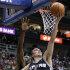 San Antonio Spurs guard Manu Ginobili (20), of Argentina, scores against Utah Jazz center Al Jefferson (25) during the first half of Game 3 in their first-round NBA basketball playoff series, Saturday, May 5, 2012, in Salt Lake City. (AP Photo/Colin E Braley)