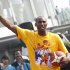 Los Angeles Lakers superstar Kobe Bryant, center, reacts during a basketball clinic on Saturday Sept. 17, 2011 in Singapore. Bryant says he's still considering playing overseas as an owners' lockout of players threatens to sabotage the upcoming NBA season. (AP Photo/Wong Maye-E)