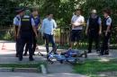 Police officers detain a man after an attack in the centre of Almaty, Kazakhstan