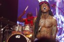 In this March 15, 2012 image, Lil Wayne performs during the SXSW Music Festival in Austin, Texas.(AP Photo/Jack Plunkett)