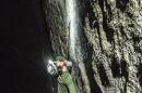 In this November 2016 photo courtesy of Heinz Zak and Black Diamond Equipment, Adam Ondra climbs pitch 21 by headlamp on the Dawn Wall of El Capitan in Yosemite National Park, Calif. A climber from the Czech Republic has scaled what's considered one of the world's most challenging rock walls found in Yosemite National Park, doing it in record time. A spokesman for Black Diamond Equipment confirmed Tuesday, Nov. 22, 2016, that 23-year-old Adam Ondra completed a half-mile free-climb up the Dawn Wall on the famous El Capitan. (Heinz Zak/Courtesy of Black Diamond Equipment via AP)