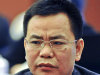 In this March 13, 2012 photo, businessman Lin Chunping attends a press conference in Wenzhou, in eastern China's Zhejiang province. In China, awash with fake iPhones, pirated DVDs of Hollywood blockbusters and knockoff Louis Vuitton bags, 41-year-old rice trader Lin took fakery to a whole new level: He invented a U.S. bank and claimed he bought it. (AP Photo)  CHINA OUT