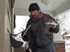 Mail carrier Zack Wyscarver delivers mail in freezing temperatures in Omaha, Neb., Monday, Dec. 5, 2011. Unprecedented cuts by the cash-strapped U.S. Postal Service will slow first-class delivery next spring and, for the first time in 40 years, eliminate the chance for stamped letters to arrive the next day. (AP Photo/Nati Harnik)