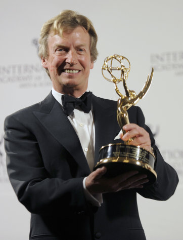 Producer Nigel Lythgoe poses with the Founders Award at the 39th International Emmy Awards, on Monday, Nov. 21, 2011, in New York. (AP Photo/Henny Ray Abrams)