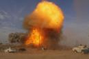 File photo of an explosion as seen during a car bomb attack at a Shi'ite political organisation's rally in Baghdad